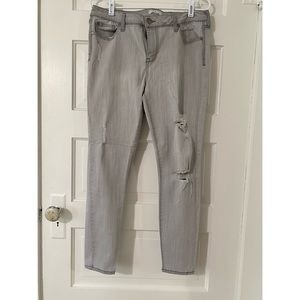 Elan. Large. Distressed denim.